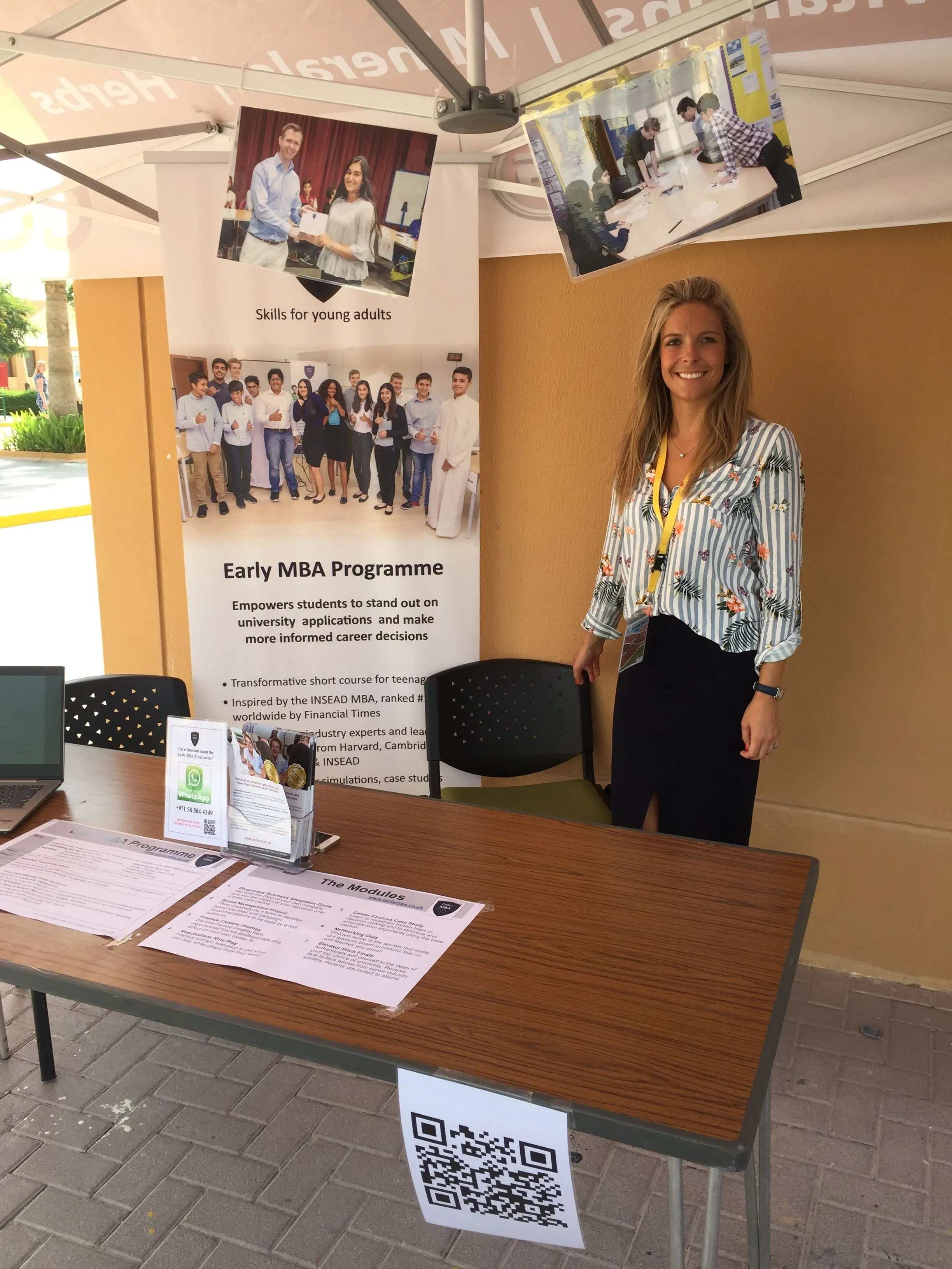 Katherine with the Leadearly Early MBA programme banner
